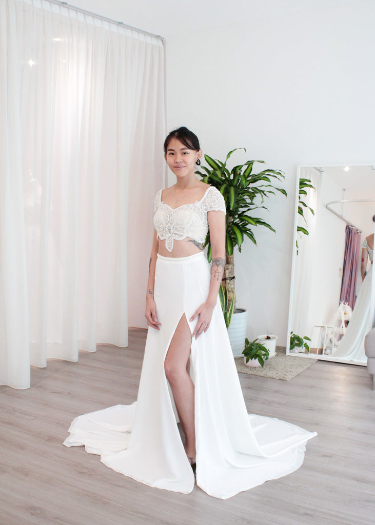 https://www.dentellebridal.com/cdn/shop/products/Bride_Clarinna-victorian-inspired-beadwork-crop-top-wedding-dress-1_1024x1024.jpg?v=1570767376